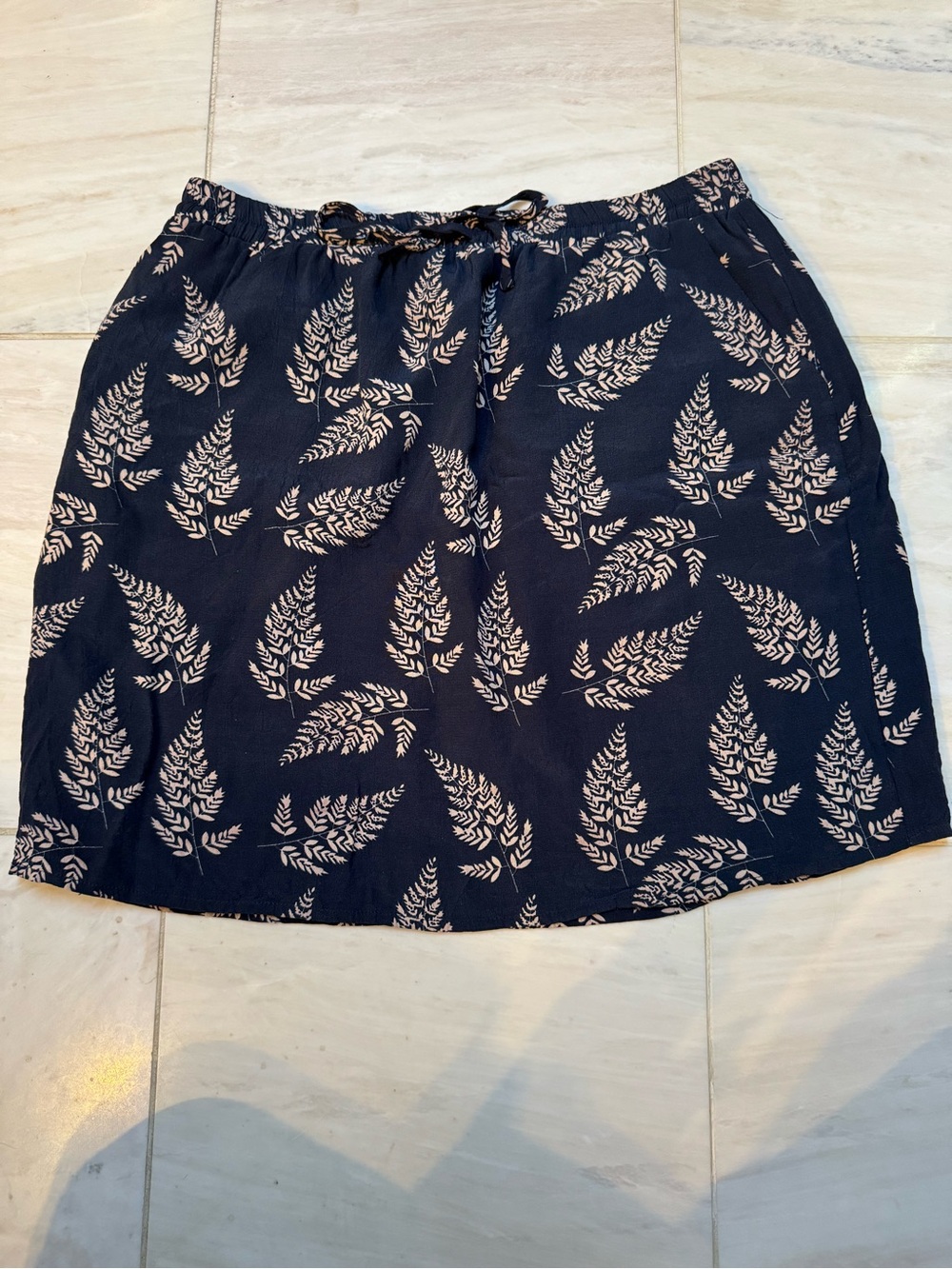 Skies Are Blue Navy Mini Skirt with Cream Leaf Print